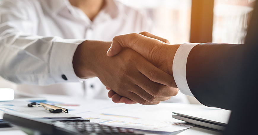 Two people shaking hands